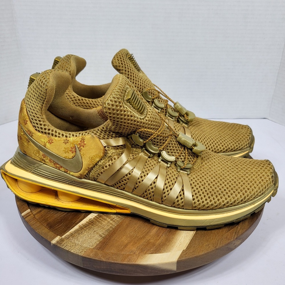 Nike Shox Gravity Women Size 9 Gold Excellent Floral AQ8554-700 Metallic Sneaker